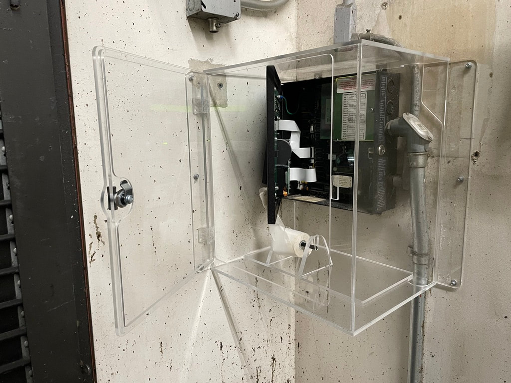 Clear acrylic box to cover electric units. 
